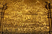 Luang Prabang, Laos - Wat Mai the gilded stucco engravings narrate the Vessantara Jataka, the penultimate rebirth as a human of the future Gotama Buddha. 